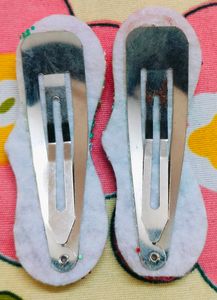 A Pair Of Glittery Rainbow Clips