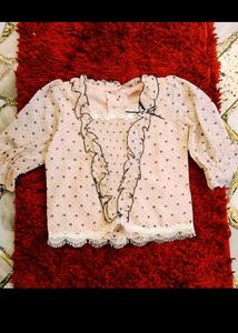50. Chic Printed Blouse with Ruffles