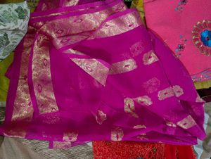 Vibrant Pink Saree with Gold Motifs