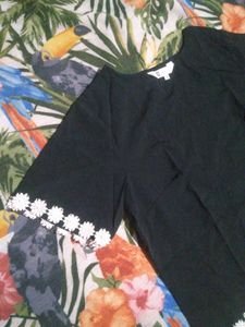 Chic Black Top with White Lace Trim