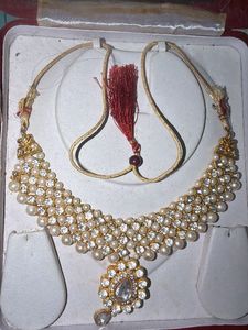 Elegant Pearl and Crystal Necklace with saree pin