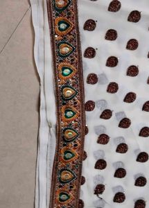 Elegant White Saree with Brown Motifs