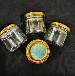 Set of 4 Small Glass Jars with Lids