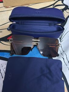 Rimless Brown Lens Sunglasses with Case