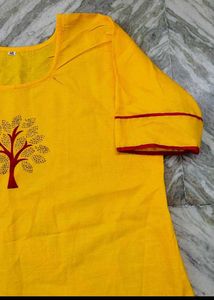 yellow kurti set for women