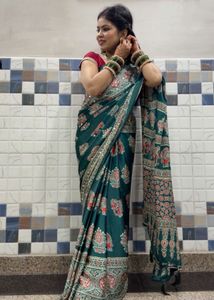 Elegant Teal Saree with Elephant Print