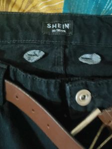 Black torn jeans