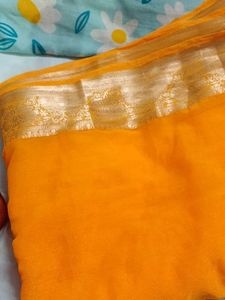 Vibrant Yellow Saree with Gold Border