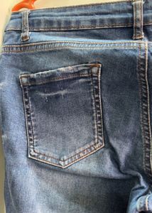 Distressed Blue Denim Jeans