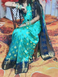 Beautiful Teal Saree with Gold Motifs