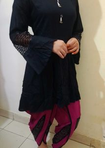 Elegant Black Kurta with Pink dhoti salwar.