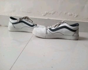 White Sneakers with Black Stripe
