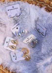 Korean Studs Silver And Gold One Pair 99