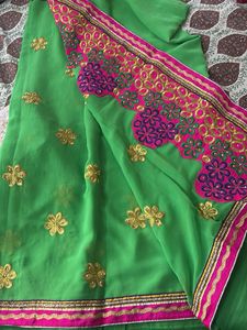 Vibrant Green Saree with Gold Embroidery