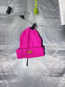 Pink Beanie Hat with Croissant Patch