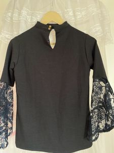 Elegant Black Top with Lace Bell Sleeves