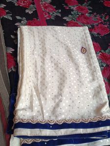 Elegant Cream Saree with Sequins