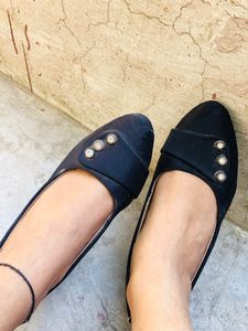 black platform with stone