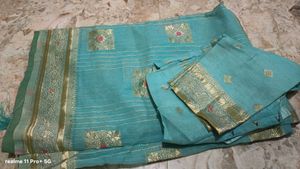 Beautiful Teal Saree with Gold Border