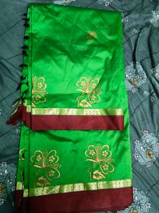 Vibrant Green Silk Saree with Gold Motifs