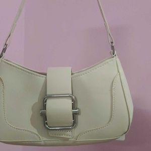 Beige sling bag