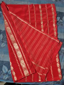 Vibrant Red Saree with Gold Border