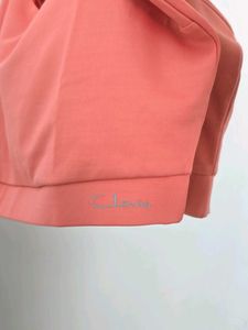Clovia Coral Cropped Sports Top with Ruffle Straps