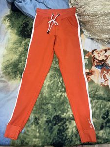 Orange Joggers with White Stripe Detail