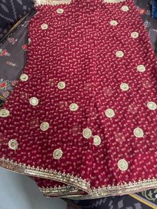 Elegant Maroon Saree with Gold Embroidery