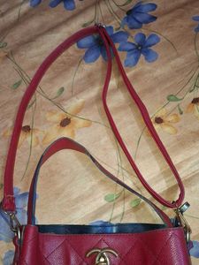 The red quilted hobo handbag