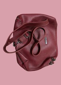 Original Flaunt Unused Maroon Sling bag