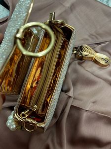 Shimmery Handbag with pearl chain