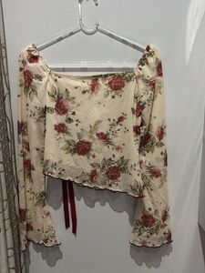 floral top with ribbon design- NOT WORN EVEN ONCE