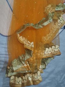 I am selling orange net top