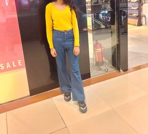 top with jeans both for women