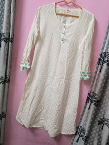 Elegant White Kurta with Teal Accents