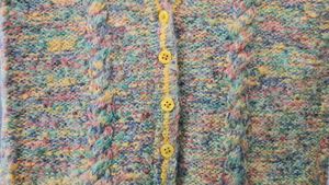 Handknitted woollen front open sleeveless Jacket