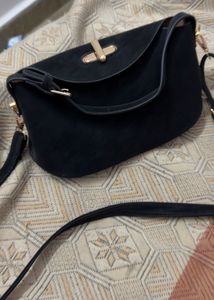 Chic Black Shoulder Bag with Gold Hardware
