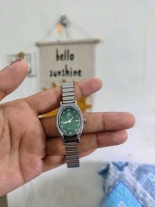 Elegant Oval Green Dial Watch