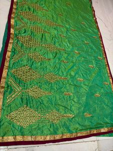 Vibrant Green Silk Saree with Gold Embroidery