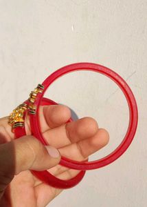 Elegant Red Bangles with Gold Accent