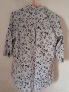 3/4th Sleeves Women's shirt rarely used in good condition.
