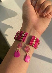 Chic Pink Beaded Bracelet with Charms