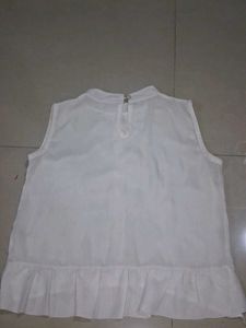 Elegant Sleeveless White Top