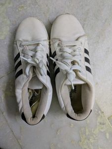 Used Classic White Sneakers with Black Stripes
