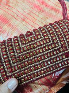 Red Embroidered saree and Blouse with Handbag