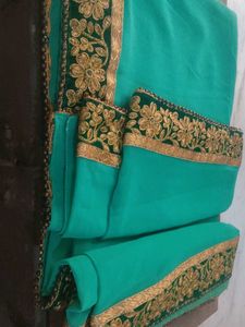 Beautiful Teal Saree with Gold Embroidery