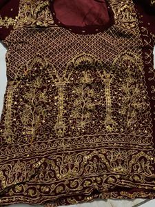 Exquisite Maroon &amp; Gold Embellished Lehenga Choli