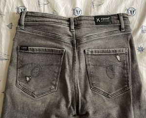 Grey Flare Jeans with Distressed Details