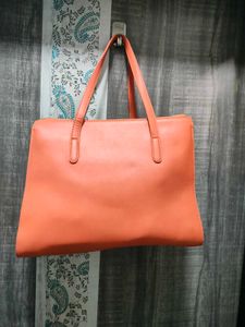 Chic Orange Laser-Cut Handbag